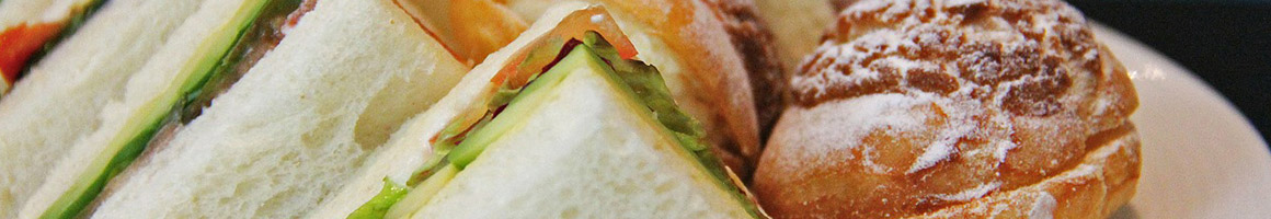 Eating Deli Sandwich at Tasty Deli restaurant in New York, NY.